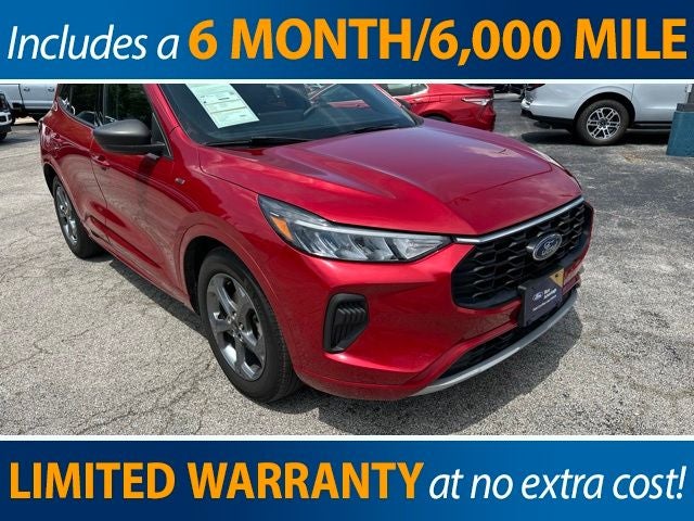 2023 Ford Escape ST-Line in Rapid Red Metallic Tinted Clearcoat — front three-quarter view