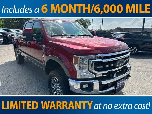 2020 Ford F-250SD Lariat in Rapid Red Metallic Tinted Clearcoat — front three-quarter view