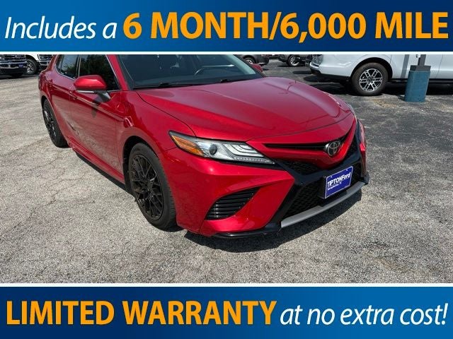 2019 Toyota Camry XSE in Supersonic Red — front three-quarter view